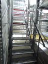 Лестница для подъема на этаж мезонинного стеллажа