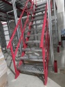 Лестница для подъема на второй этаж мезонинного стеллажа